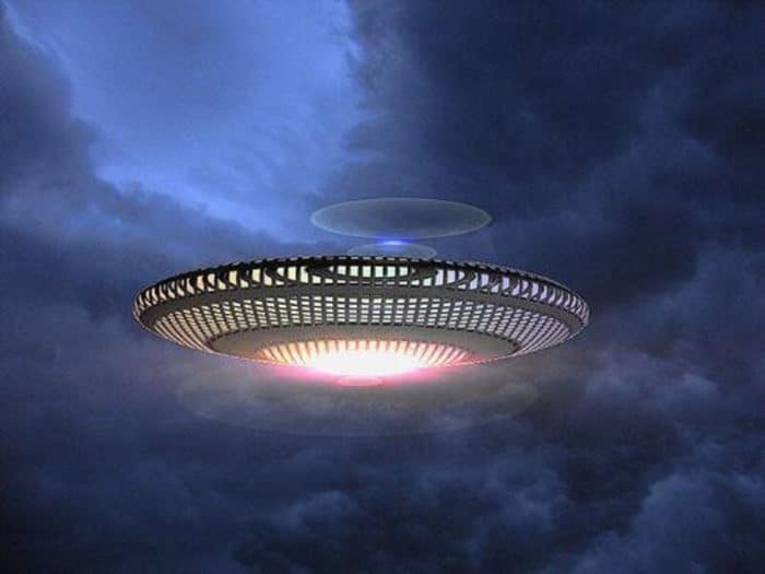 Depiction of a UFO in a cloudy sky