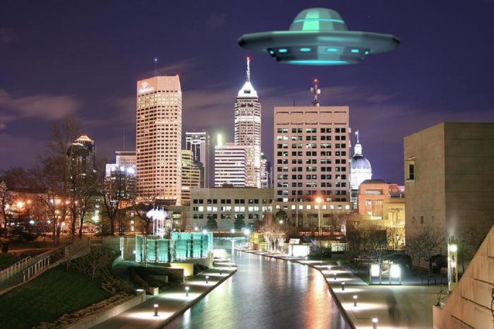 Depiction of a UFO over a city in Indiana at night