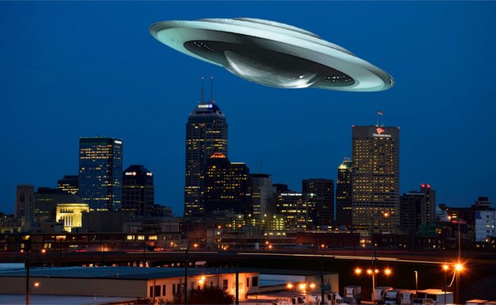 A depiction of a UFO over Indiana at night
