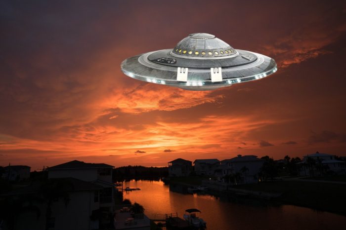 A picture of a Florida lake with a superimposed UFO over the top