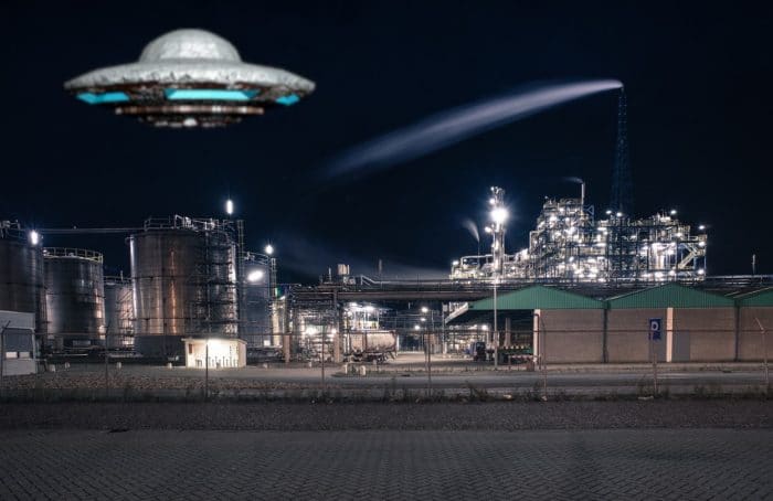 A depiction of a UFO over a power plant