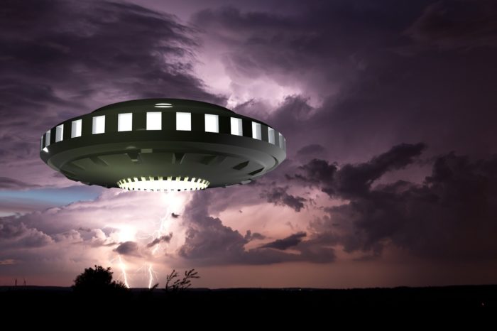 A depiction of a UFO in a stormy sky