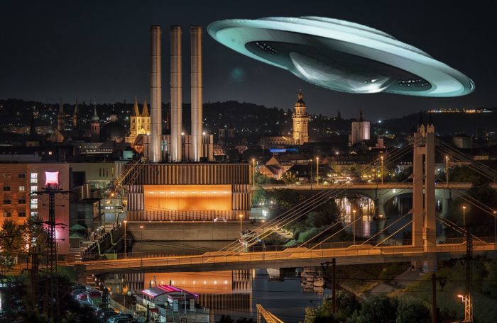 A superimposed UFO over a German city at night