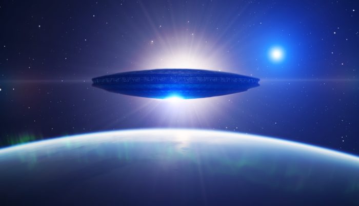 A depiction of a UFO high above the Earth