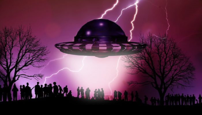 A depiction of a UFO hovering over a crowd of people