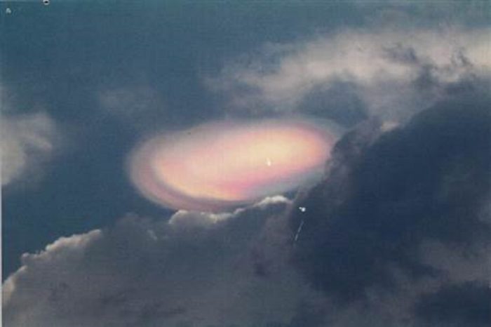 A depiction of a glowing UFO