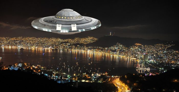 An superimposed UFO over a night scene