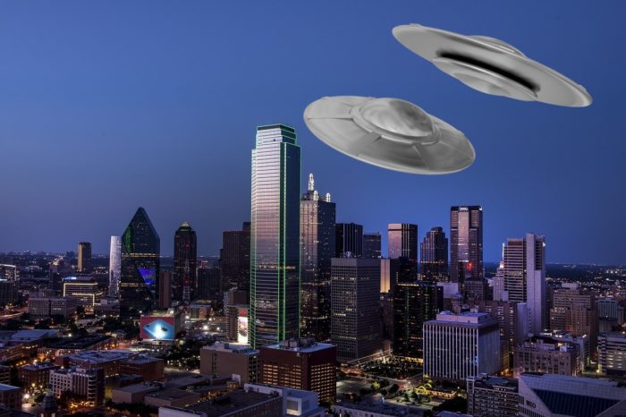 Two UFOs superimposed over a picture of downtown Dallas