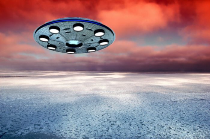 A depiction of a UFO flying through a sunset sky