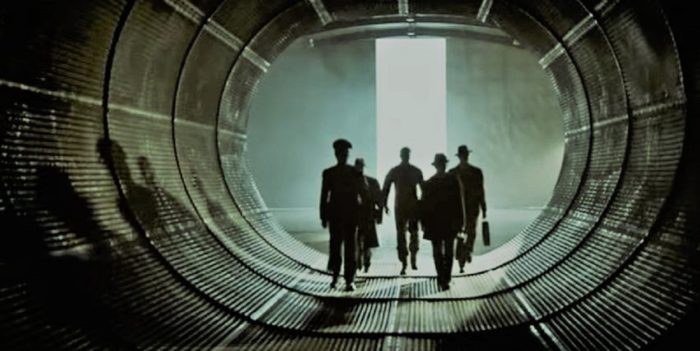 A depiction of military officers walking through a secret tunnel