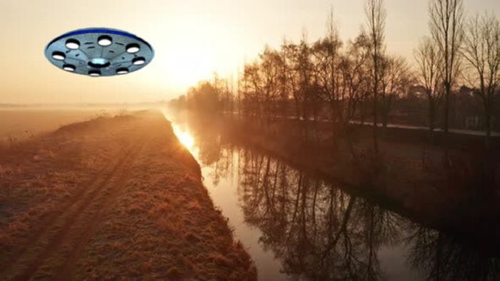 A superimposed UFO over a river
