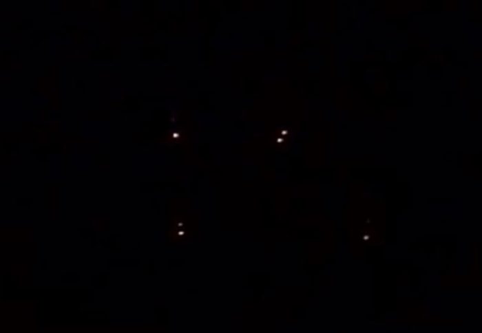 A picture claiming to show the lights of a UFO changing position/shape