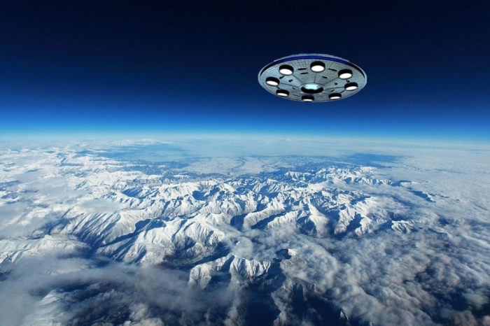 A UFO superimposed on to an aerial picture of the mountains