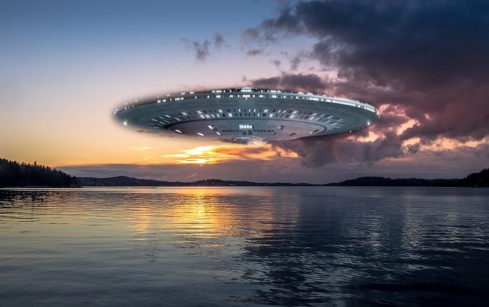 A superimposed UFO over a picture of a lake