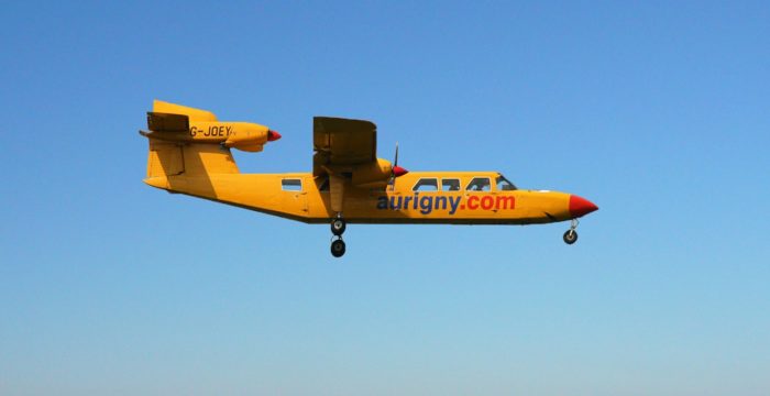 A small plane in the daytime sky