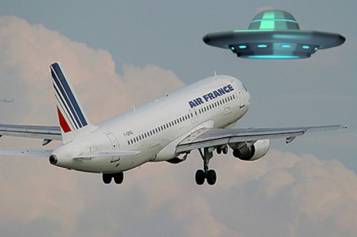 A picture of an Air France plane taking off with a superimposed UFO over the top