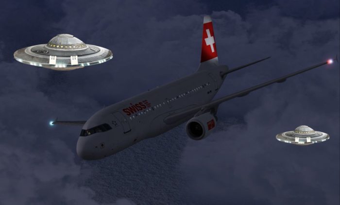 A picture of a Swiss plane with two superimposed UFOs in the background