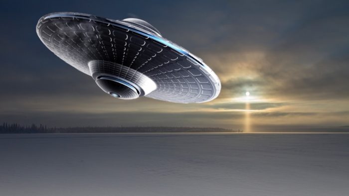 a superimposed UFO over an icy lake