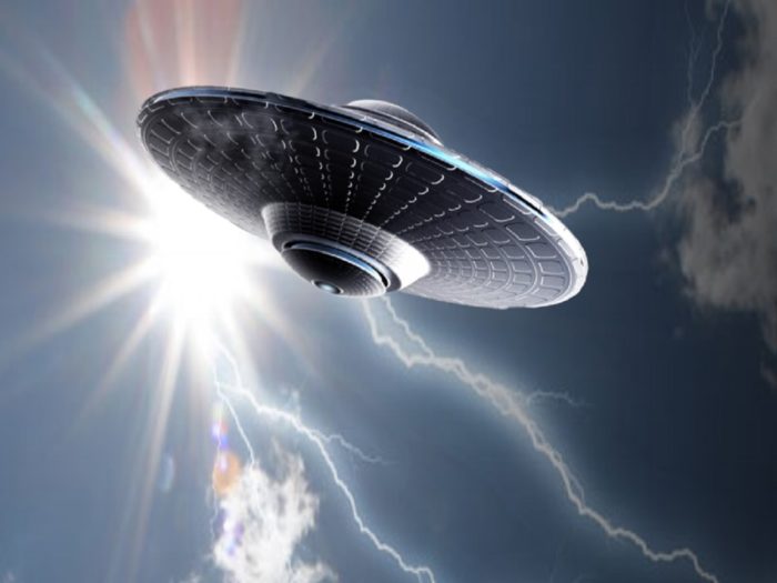 A superimposed UFO on to a picture of bright daytime sky