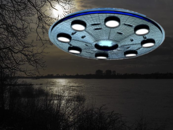 A superimposed picture of a UFO over a river