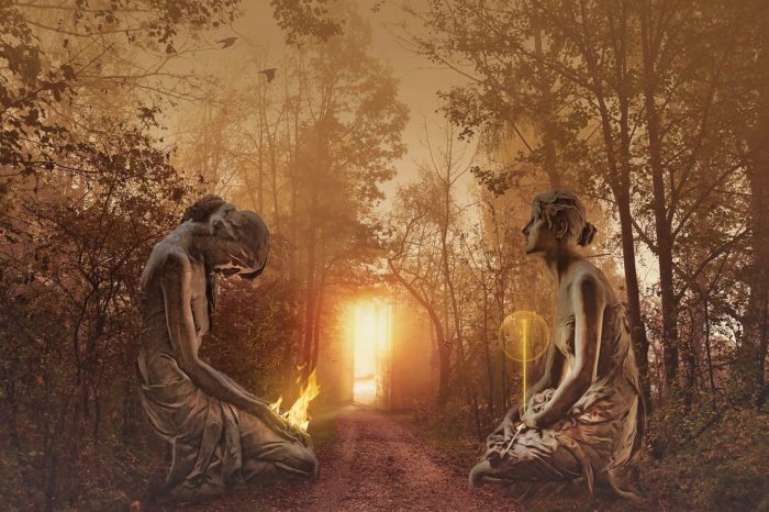 A picture of two praying statues superimposed into a forest