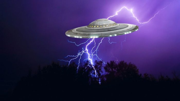 A superimposed UFO onto a lightning covered sky