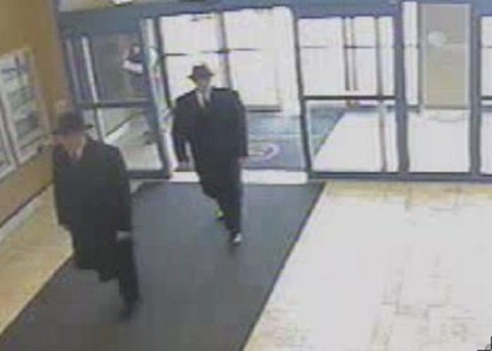 Still frame from security camera showing alleged Men In Black