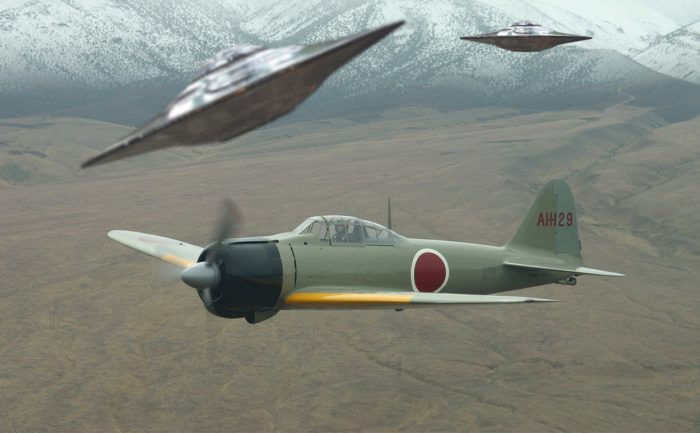 Two flying saucers flying near a World War Two type plane