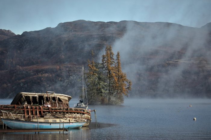 A ruined boat on the waters of Loch Ness