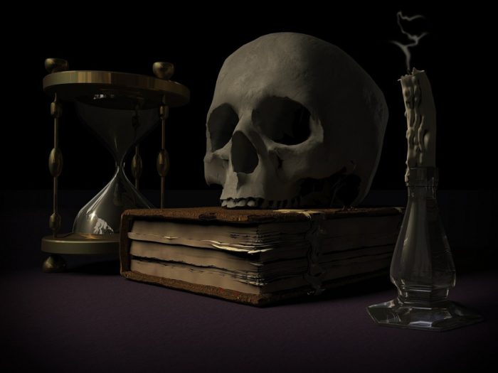 A picture of a book with a skull on the top