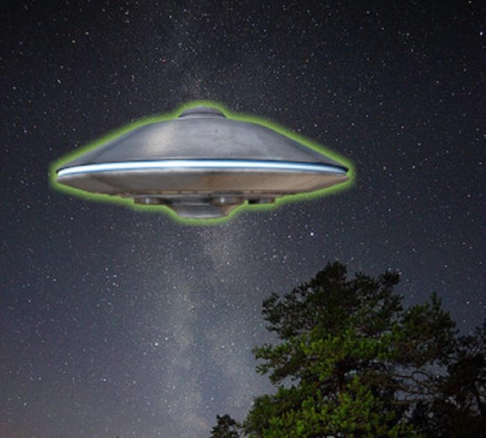 A superimposed UFO in a night sky