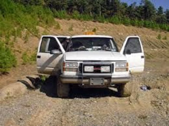 The Jamisons' truck as it was found, empty with open doors