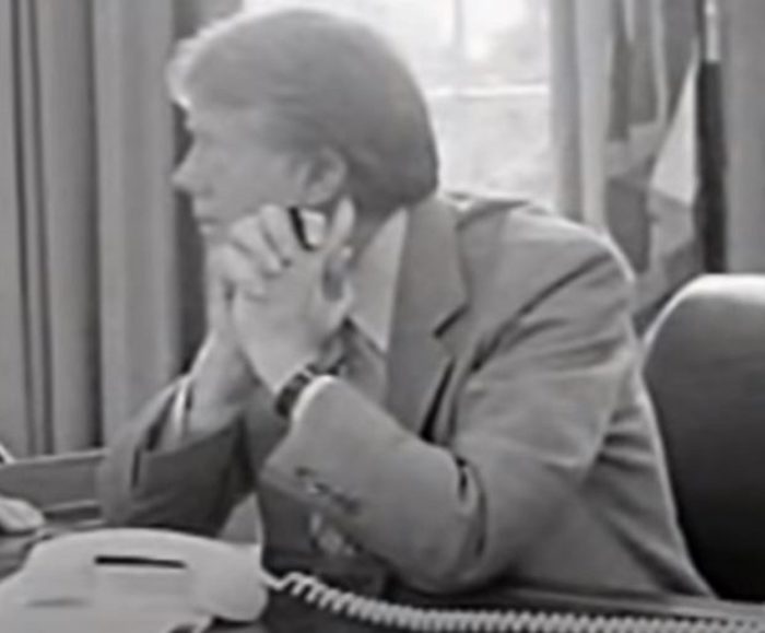 Jimmy Carter speaking on the phone at the White House