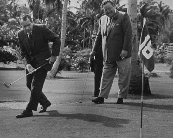 Richard Nixon playing golf with Jackie Gleason in Florida, 1974