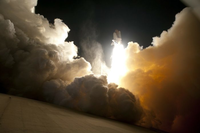 A picture of a shuttle launching 