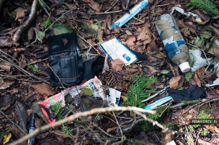 A picture of discarded belongings on the forest floor