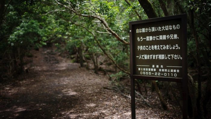 A sign warning against suicide in the Suicide Forest