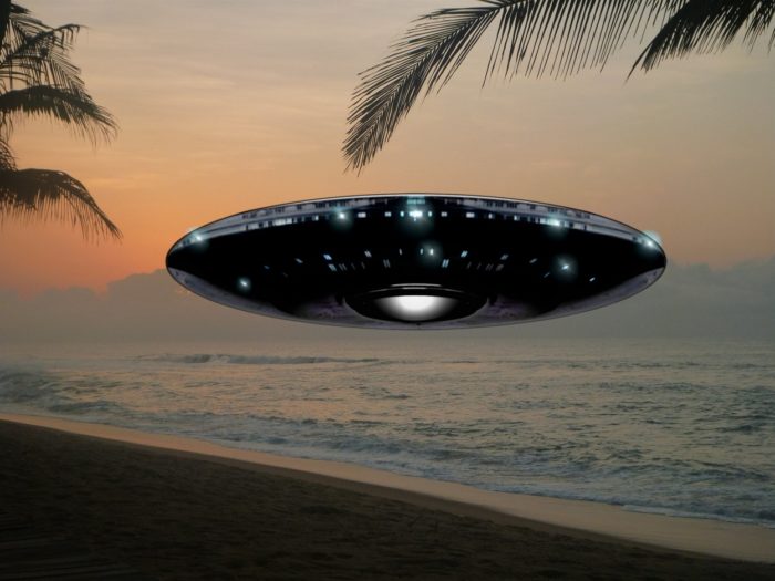 Superimposed UFO on a beach