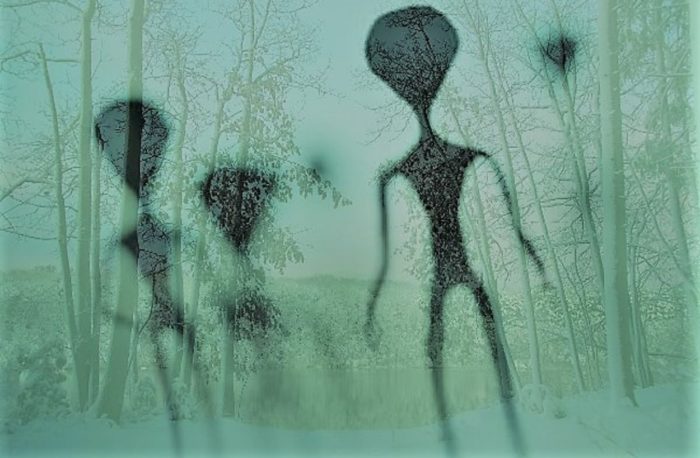 Alien figures superimposed over a snowy scene