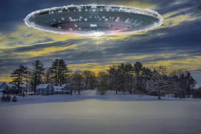 A UFO superimposed over a snowy scene