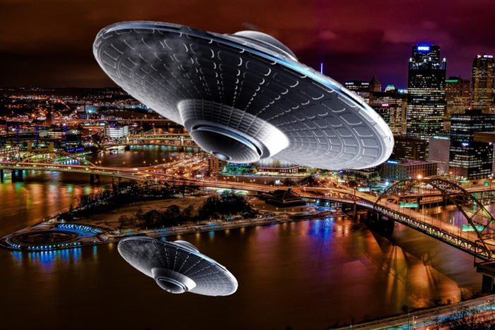 Two superimposed UFOs over a lake