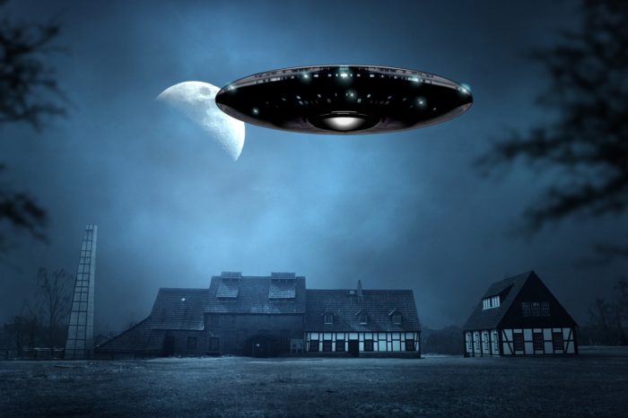 A superimposed UFO over a quiet country house