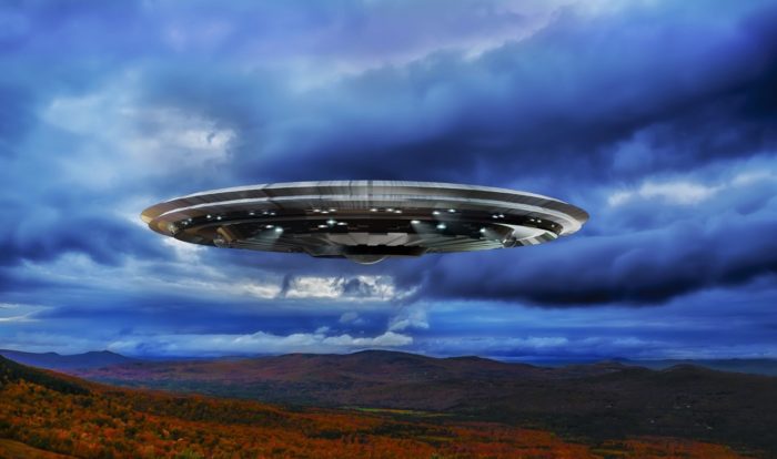 A superimposed UFO over the countryside