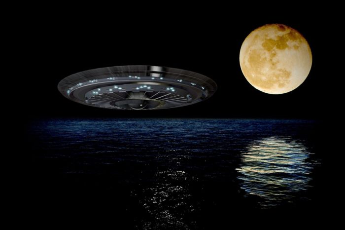 A superimposed UFO over the ocean at night