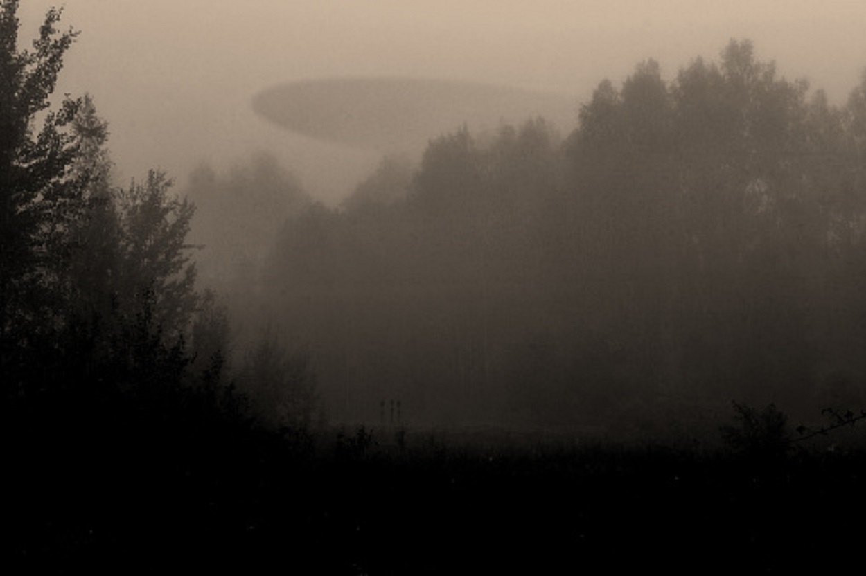 A depiction of a UFO in the fog