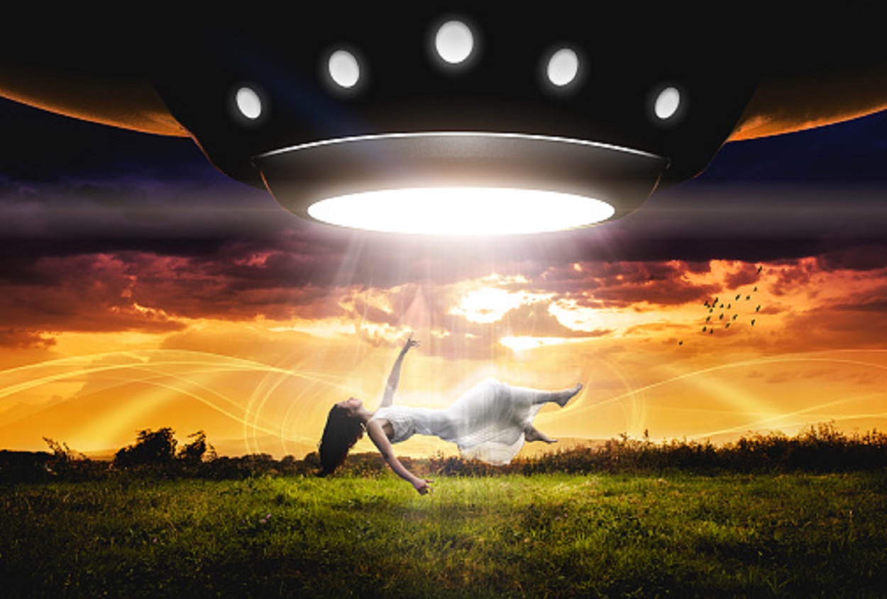 A depiction of an alien abduction