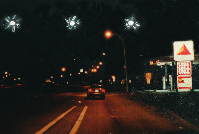 Picture of the road where the sighting happened with "lights" added to show how they appeared