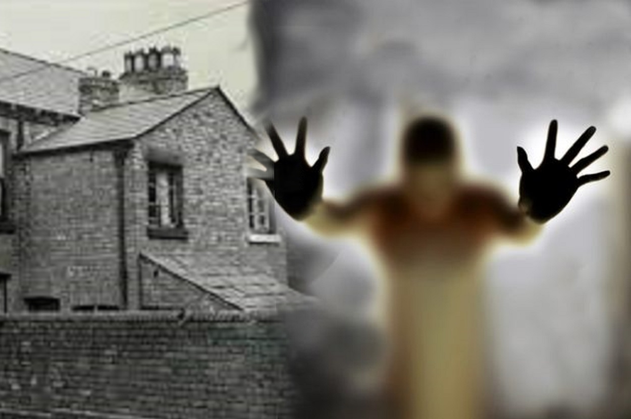 A depiction of a ghost blended into a haunted house