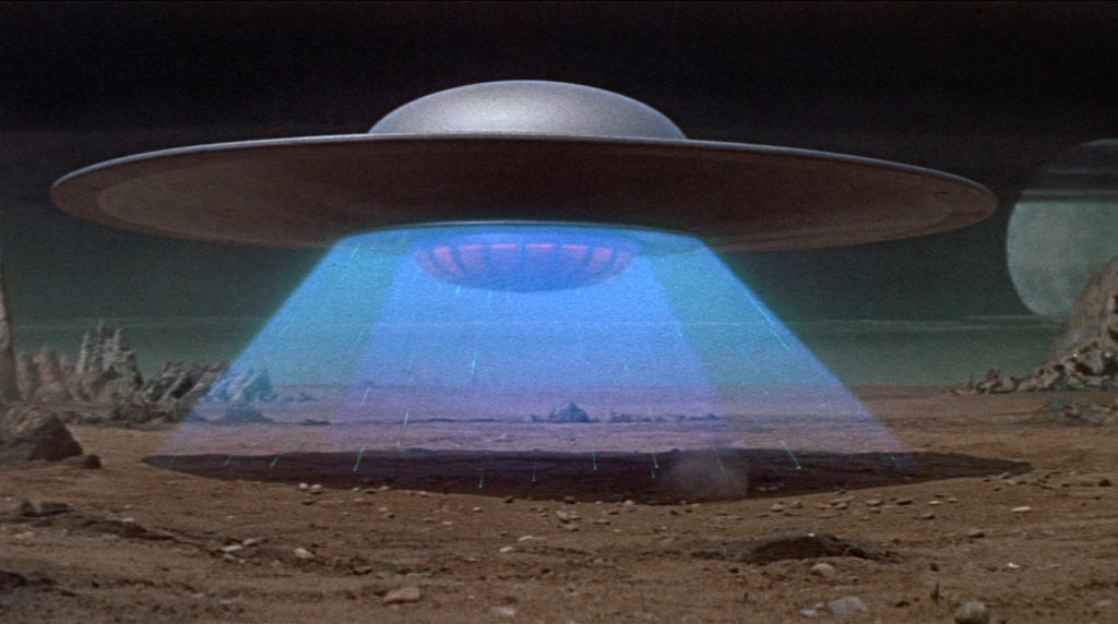 A depiction of a UFO near the ground
