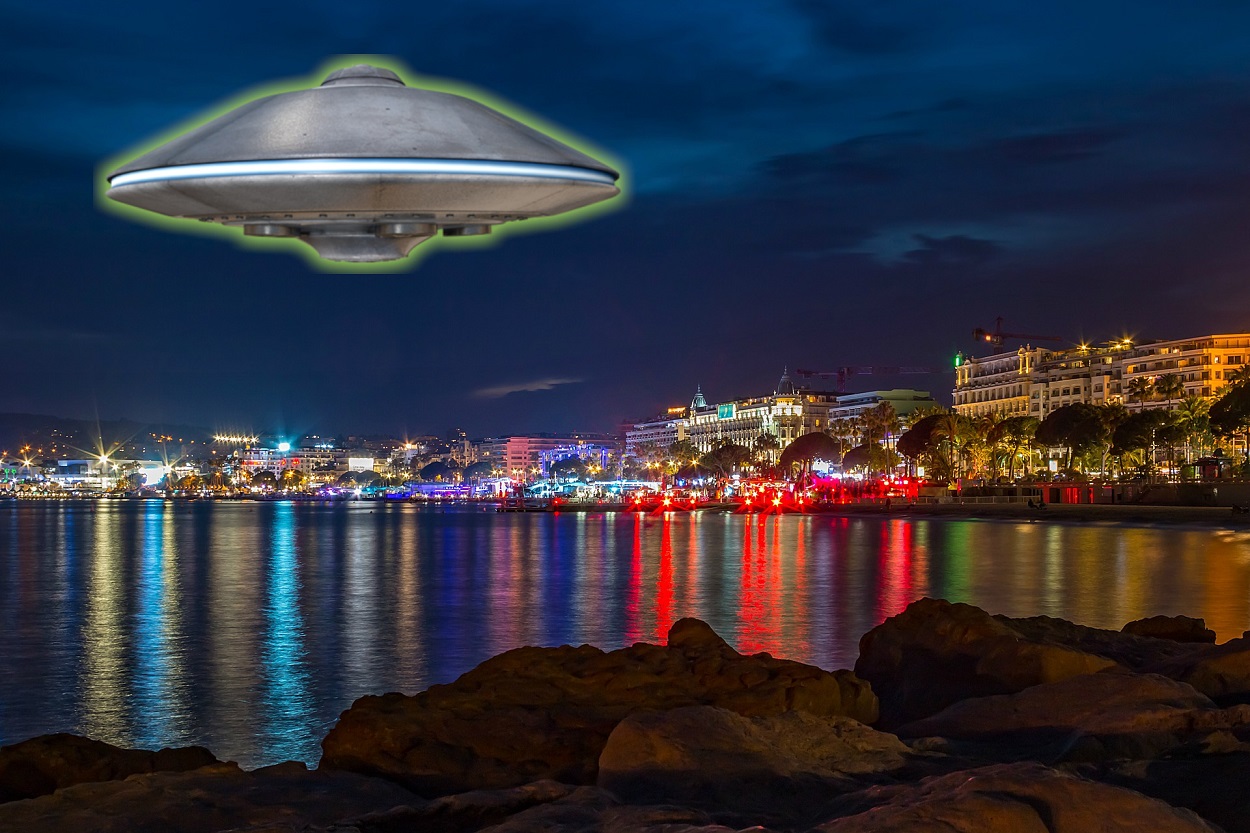 A depiction of a UFO over the water